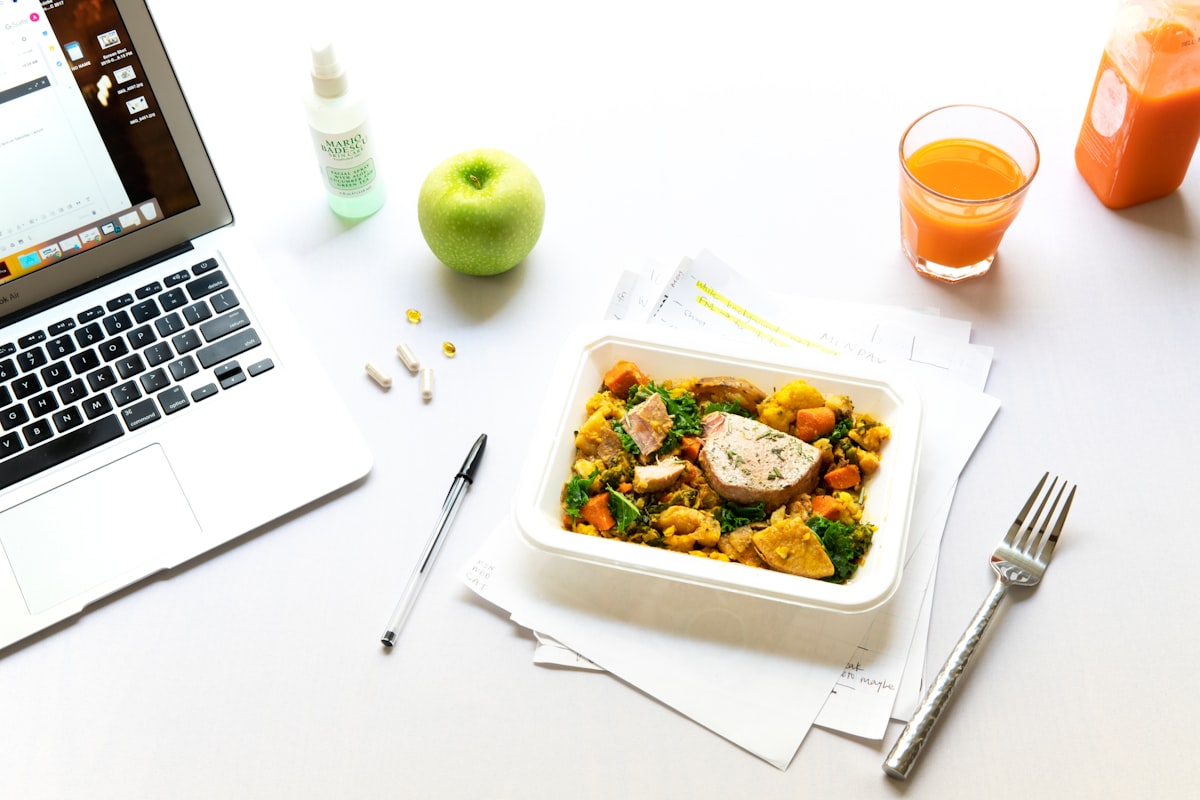 Nutritionist consulting with client about dietary needs